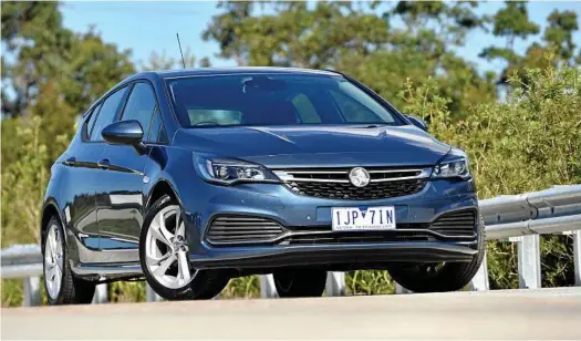  ??  ?? SHARP SUIT: The new Holden Astra hatch in mid-range RS spec means a lusty 1.6-litre turbo petrol engine offering a strong 147kW and 300Nm, decent specificat­ion inclusions and sporty styling. It is priced from $26,240 before on roads, or $1000 more for...