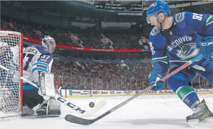  ?? — GETTY IMAGES FILES ?? Sam Gagner has struggled to score on the likes of Winnipeg’s Connor Hellebuyck this season, but the Canucks are using him as more of a shutdown forward.