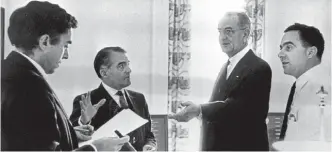  ?? AP ?? Richard Goodwin receiving an honorary doctorate from the University of Massachuse­tts Lowell in 2010, and at the White House, far left, with president Lyndon Johnson, second right.