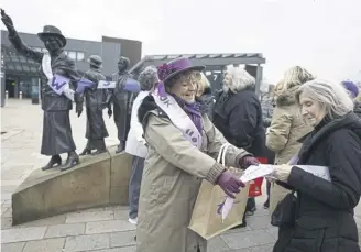  ?? PICTURE: JEFF J MITCHELL/GETTY IMAGES ?? Waspi women gather at the statue of political activist Mary Barbour in Govan