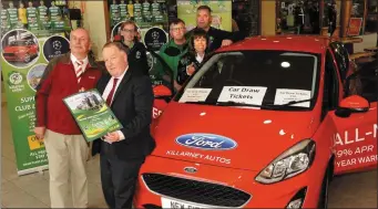  ??  ?? FRONT: Paul Sherry(Killarney Outlet Centre Manager) and Dermot Moriarty (Killarney Autos). BACK: Jane and John O’Donoghue (Football for All), and Killarney Celtic officers Mike and Mary Lyne.