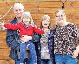  ?? ?? Daria Wood and daughter Emma, with her parents in Cherkasy, Ukraine, in 2019