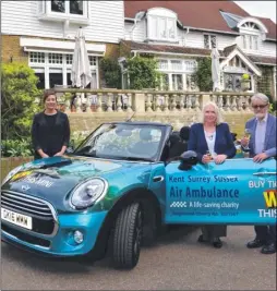  ??  ?? Jenifer Cox with the car she won, outside the Rowhill Grange Hotel and Utopia Spa