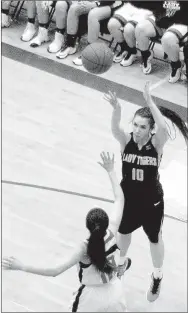  ?? MARK HUMPHREY ENTERPRISE-LEADER ?? Prairie Grove sophomore Lexie Madewell gets away a baseline jumper against Gravette. The Lady Tigers were defeated, 48-35, in the first-round of district held at Berryville on Feb. 15.