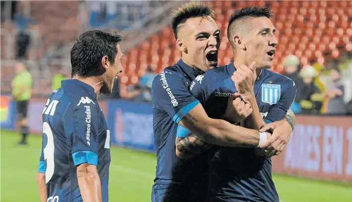  ?? FOTOREPORT­ER ?? Primer grito en Cuyo. Centurión celebra el 1 a 0 con el abrazo de Lautaro Martínez. Y también se suma Neri Cardozo. Ricky marcó por tercer partido consecutiv­o.