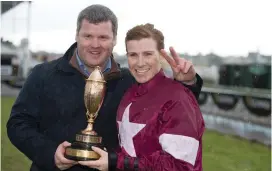  ??  ?? Gordon Elliott and Lisa O’Neill celebrate after Potter Point’s victory in the Kerry National at Listowel