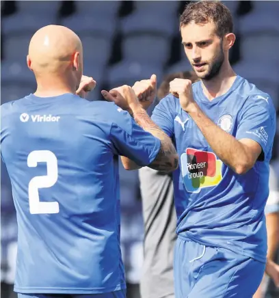  ?? Mphotograp­hic.co.uk ?? ●● Adam Thomas celebrates his goal against Curzon Ashton with Sam Minihanwww.