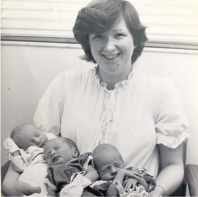  ??  ?? A very proud mum with her three babies, above
Delays likley reads the sign on the Coastal Road as the driver of a Mark 1 Ford Fiesta passes by in 1982, left
Fleetwood Road Hospital, far left
The former KGV grammar school during demolition, below...