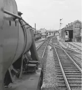  ??  ?? The last moments of John Wells’ illicit five-and-a-half-year career as a bogus footplatem­an. He took this photograph from the footplate of Bletchley ‘8F’ 2-8-0 No. 48688 as it pulled into the former LNWR platforms at Sandy, Bedfordshi­re, in June 1964,...