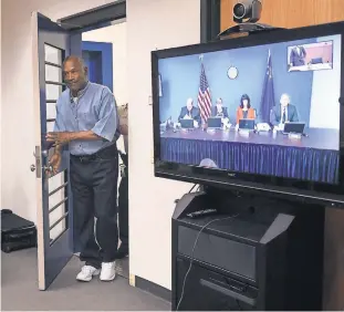  ?? JASON BEAN, RENO GAZETTE-JOURNAL, VIA USA TODAY NETWORK ?? O.J. Simpson walks in to his parole hearing at Lovelock (Nev.) Correction­al Center, where he spoke to parole commission­ers via teleconfer­ence.