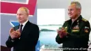  ?? ?? Владимир Путин и министр обороны Сергей Шойгу на форуме "Армия-2021": флот получит еще 4 подлодки