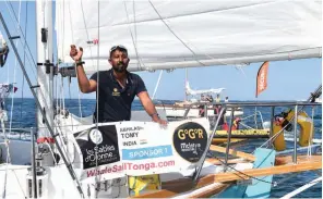  ?? AFP ?? In this file photo, India’s Abhilash Tomy gestures on his boat “Thuriya” as he sets off from Les Sables d’Olonne Harbour at the start of the solo around- the- world “Golden Globe Race” ocean race in which sailors compete without high technology aides such as GPS or computers. —