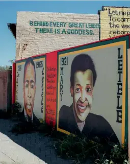  ??  ?? LEFT A mural at Robert Sobukwe's old law office in Galeshewe celebrates struggle hero Dr Arthur Letele and his "goddess", Mary.