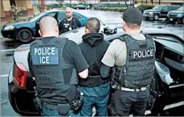  ?? CHARLES REED/U.S. IMMIGRATIO­N AND CUSTOMS ENFORCEMEN­T ?? ICE agents have stepped up arrests of immigrants living in the country illegally.