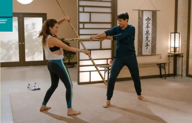  ??  ?? Mary Mouser with her onscreen dad, Ralph Macchio, in Netflix’s Cobra Kai.
