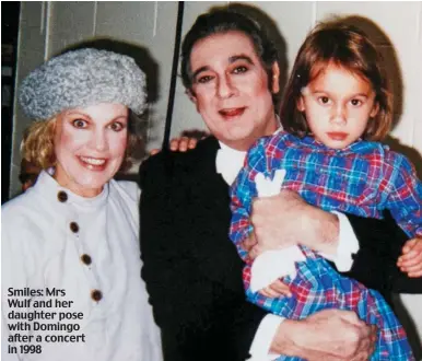  ??  ?? Smiles: Mrs Wulf and her daughter pose with Domingo after a concert in 1998