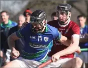  ??  ?? Michael Doyle of Glynn-Barntown wins the ball as Patrick O’Connor (St. Martin’s) challenges.