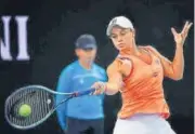  ?? AFP ?? Top-ranked Ashleigh Barty beat Garbine Muguruza 7-6(3), 6-4 in the final of the WTA warm-up tournament on Sunday.