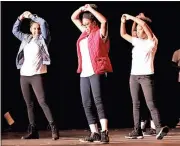  ?? Photos by Spencer Lahr, Rome News-Tribune ?? TOP: West End Elementary School student Alaya Bailey sings Aretha Franklin’s “Respect.” ABOVE: Members of the Rome Middle School dance team perform a tribute to Michael Jackson.