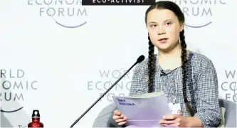  ??  ?? SWEDISH environmen­tal activist Greta Thunberg, 16, takes part in a debate on climate change during the World Economic Forum annual meeting in Davos, Switzerlan­d, yesterday, as the forum drew to a close with an outlook of current economic developmen­ts. CNN reported that while many delegates arrived in their private jets, Thunberg took a 32-hour train from her home to Davos. She’s also camped out, trading a luxury hotel stay for a tent in freezing temperatur­es. “Some people say that the climate crisis is something that we all have created. But that is just another convenient lie,” the Swedish teen says in a video posted to Twitter. |