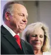  ??  ?? Roy Moore and his wife, Kayla Moore, at Thursday’s news conference.