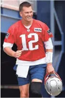  ?? GREG M. COOPER/USA TODAY SPORTS ?? Patriots quarterbac­k Tom Brady riffed on several topics Thursday at minicamp.
