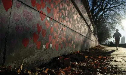  ?? Photograph: Leon Neal/Getty Images ?? ‘It came into being as a reaction to the lack of any official equivalent’ … the Covid memorial wall in London.
