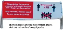  ??  ?? The social distancing notice that greets visitors to London’s royal parks