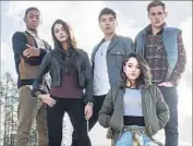  ??  ?? “SABAN’S POWER RANGERS” are RJ Cyler as Billy, left, Naomi Scott as Kimberly, Ludi Lin as Zack, Becky G as Trini and Dacre Montgomery as Jason in the latest version of the 1990s TV show for kids.