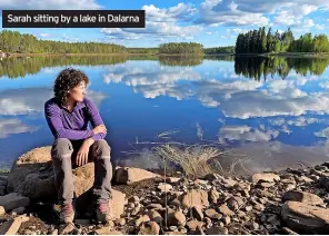  ?? ?? Sarah sitting by a lake in Dalarna