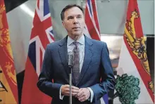  ?? PATRICK DOYLE THE CANADIAN PRESS FILE ?? A memo for Finance Minister Bill Morneau predicts lower job growth.