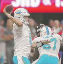  ?? | AP ?? Dolphins QB Jay Cutler threw two touchdown passes in the third quarter.