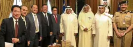  ??  ?? LINKS RESTORED The Philippine delegation, led by Silvestre Bello III and Harry Roque, meets with its Kuwaiti counterpar­t.