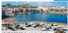  ??  ?? A PLACE IN THE SUN: The idyllic Marsalforn Bay and, right, Malta fans Brad Pitt and Angelina Jolie