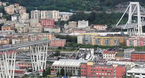  ?? Photo: Reuters ?? A truck sits near the edge of the collapsed Morandi bridge in the Italian port city of Genoa yesterday.