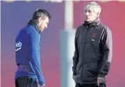  ?? REUTERS ?? Barcelona coach Quique Setien and Lionel Messi during training.