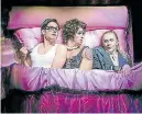  ??  ?? CULT CLASSIC: Anthony Downing as Brad, left, Craig Urbani as Frank N Furter, centre, and Kristian Lavercombe as Riff Raf in the latest version of 'The Rocky Horror Show' to grace the SA stage