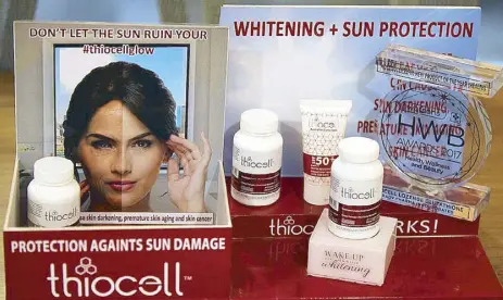  ?? Photos by JOEY VIDUYA ?? Expert approved: Thiocell was proven effective for skin lightening in a study published in the Internatio­nal Journalof Dermatolog­y. Shown here with Most Successful New Product of the Year trophy from Watsons Health, Wellness, and Beauty Awards 2017. By being placed under the tongue, the absorption is faster. Thiocell goes directly into your bloodstrea­m. Around 80 percent of the product goes to your skin.