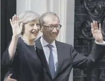  ??  ?? 0 Newly appointed Prime Minister Theresa May with her husband Philip arrive at 10 Downing Street on July 13, 2016