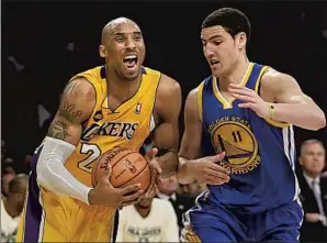  ?? Robert Gauthier Los Angeles Times ?? TRYING TO GUARD his idol in 2013, Klay Thompson is one of the players who grew up watching Kobe Bryant and, at first, hoped simply for Bryant to notice him.