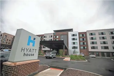  ?? PHOTOS BY COURTNEY HERGESHEIM­ER/COLUMBUS DISPATCH ?? The new Hyatt House on West Fifth Avenue near Olentangy River Road west of the Short North and south of Ohio State University is geared toward extended-stay guests.