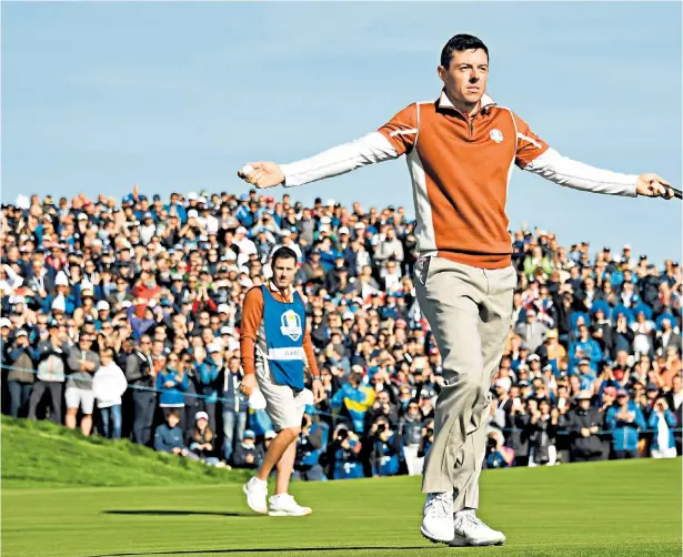  ??  ?? Hitting back: Rory McIlroy makes his feelings clear to the fan who claimed he ‘can’t putt’; (above, from top) Paul Casey hides his face after breaking down in tears on winning his first Ryder Cup match in 10 years; Tiger Woods struggles and Justin Thomas leads the US fightback