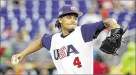  ?? LYNNE SLADKY / ASSOCIATED PRESS ?? U.S. starter Chris Archer pitches against Colombia during a first-round game of the World Baseball Classic in Miami. The U.S. won 3-2 in 10 innings.