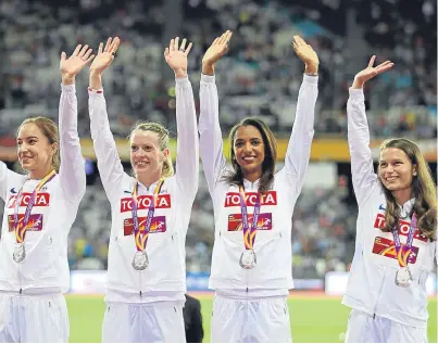  ?? Getty Images. Picture: ?? Eilidh Doyle, second left, and Zoey Clark, right, on the podium with team-mates Emily Diamond and Laviai Nielsen.