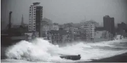  ?? ASSOCIATED PRESS FILE PHOTO ?? Waves brought by Hurricane Irma hit the Malecon seawall in Havana, Cuba.