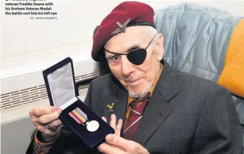  ?? PIC: ARWYN ROBERTS ?? ■ Parachute Regiment veteran Freddie Deane with his Arnhem Veteran Medal: the battle cost him his left eye