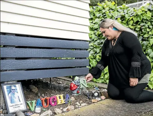  ??  ?? Genevieve Simpson beside the memorial garden she created for her older brother Vaughan Te Moananui, in front of her Thames home, where he was shot by police in Many 2015. CHRISTEL YARDLEY/STUFF