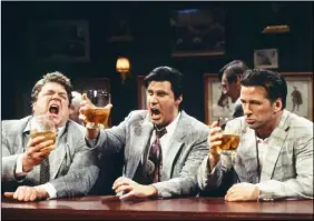  ??  ?? ‘Three more large ones for the road!’: John Goodman, Will Ferrell and Alec Baldwin as hard-drinking salesmen on Saturday Night Live, December 1998