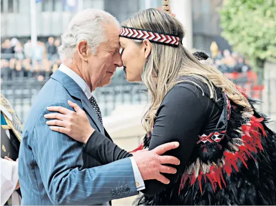  ?? ?? The King is welcomed with a traditiona­l Maori greeting, above, by the Ngāti Rānana London Māori Club as, right, the Queen and Princess of Wales went ahead to celebrate the annual Commonweal­th Day service at Westminste­r Abbey yesterday