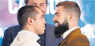  ?? Picture: ?? Scott Quigg, left, head to head with Jono Carroll in Manchester.